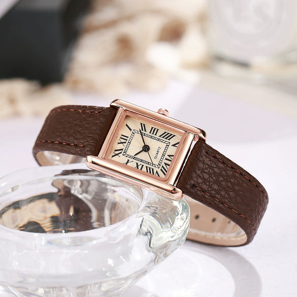 Female Leisure Quartz Watch With Alloy Case Imitation Leather Strap And Round Dial