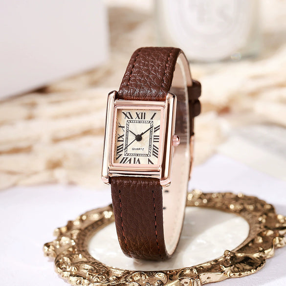 Female Leisure Quartz Watch With Alloy Case Imitation Leather Strap And Round Dial