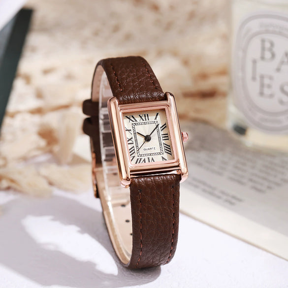 Female Leisure Quartz Watch With Alloy Case Imitation Leather Strap And Round Dial