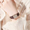 Female Leisure Quartz Watch With Alloy Case Imitation Leather Strap And Round Dial