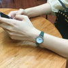 Female Retro Casual Quartz Watch With Alloy Case Genuine Leather Strap And Round Dial