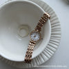 Female Student Round Alloy Case Fine Steel Belt Watch With Fritillary Pattern And Small Diamond Embedded Retro Light Luxury Style