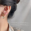 French Retro Bow Cat Eye Stone Earrings For Women Gold Plated Alloy Geometric Earrings With Set Stone Detail