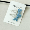Girls Fabric Handmade Star Bow Hair Clips In Sea Blue And Silver With Rhinestone Bangs And Duckbill Clips