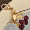 Gold Electroplated Car Key Pendant With Bear Cherry Fourleaf Clover And Butterfly Patterns For Schoolbag Jewelry Wholesale