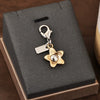 Gold Electroplated Car Key Pendant With Bear Cherry Fourleaf Clover And Butterfly Patterns For Schoolbag Jewelry Wholesale