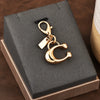 Gold Electroplated Car Key Pendant With Bear Cherry Fourleaf Clover And Butterfly Patterns For Schoolbag Jewelry Wholesale