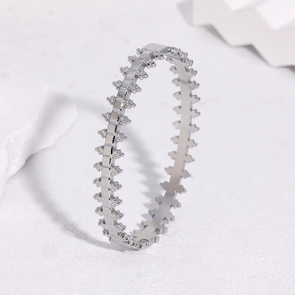 Gold Electroplated Stainless Steel Clasp Bracelet With Geometric Unique Design And Tarnish Resistant Finish