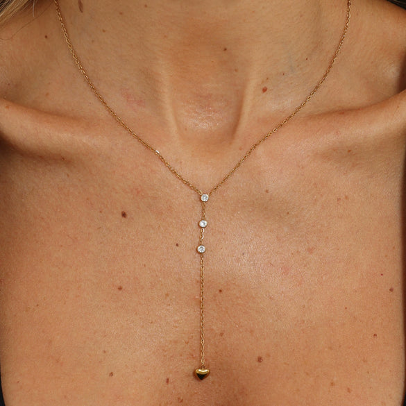 Gold Plated Stainless Steel Heart Geometric Pendant Necklace For Women With Decorative Tassel Detail