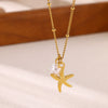 Gold Tone Stainless Steel Ocean Animal Pendant Necklace With Seahorse Conch Starfish And Faux Pearl On An Adjustable Olink Chain