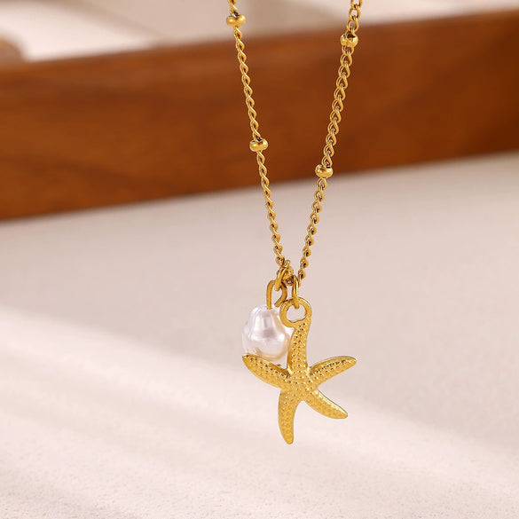 Gold Tone Stainless Steel Ocean Animal Pendant Necklace With Seahorse Conch Starfish And Faux Pearl On An Adjustable Olink Chain