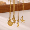 Gold Tone Stainless Steel Ocean Animal Pendant Necklace With Seahorse Conch Starfish And Faux Pearl On An Adjustable Olink Chain