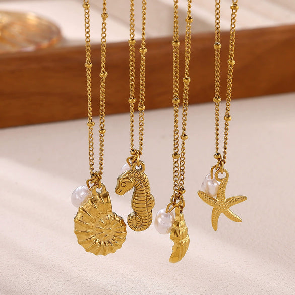 Gold Tone Stainless Steel Ocean Animal Pendant Necklace With Seahorse Conch Starfish And Faux Pearl On An Adjustable Olink Chain