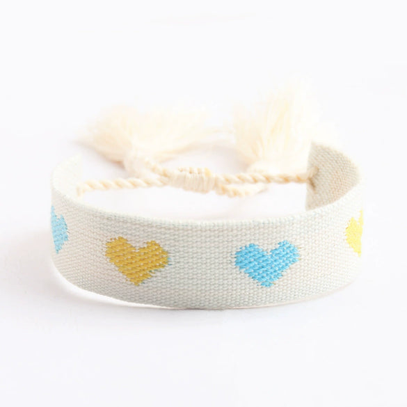 Handwoven Cord Bracelet With Embroidery And Tassel