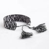 Handwoven Cord Bracelet With Embroidery And Tassel