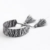 Handwoven Cord Bracelet With Embroidery And Tassel