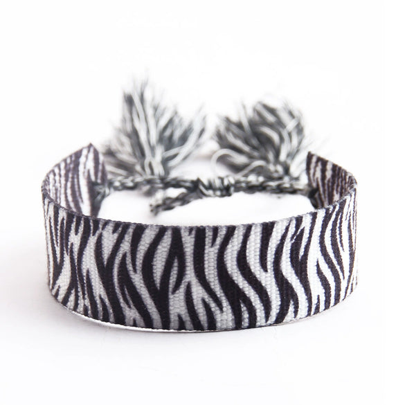 Handwoven Cord Bracelet With Embroidery And Tassel