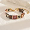 Handwoven Glass And Stainless Steel Heart Bracelet With Colorful Checkered Pattern
