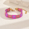Handwoven Glass And Stainless Steel Heart Bracelet With Colorful Checkered Pattern