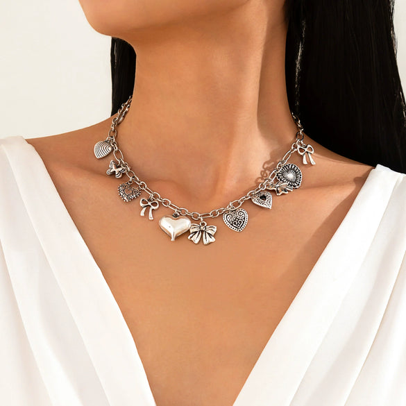 Jewelry Punk Style Alloy Pendant Clavicle Chain With Heart Shape And Bow Tie Pattern And Electroplating Treatment