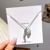 Jewelry Silver Cat's Eye Stone Tassel Purse Pendant O Chain Necklace For Women Titanium Steel Copper Electroplating Light Luxury
