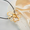 Jewelry Stainless Steel Hollow Flower Pendant Necklace With Electroplating Treatment And Cowhide Rope