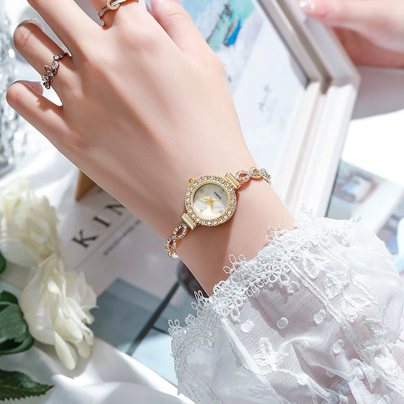 Ladies Casual Alloy Round Quartz Watch With Stainless Steel Buckle