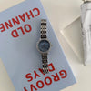 Ladies Casual Metal Quartz Watch With Round Dial And Steel Band