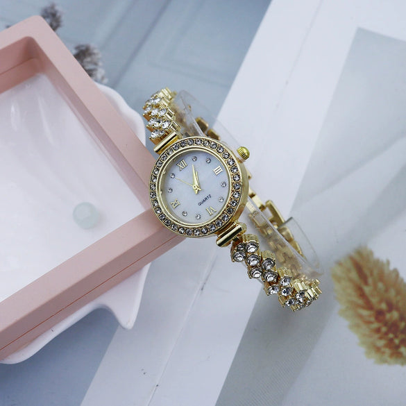 Ladies Fashionable Alloy Bracelet Watch With Round Dial And Spiral Crown