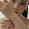 Ladies Light Luxury Seamless Freshwater Pearl 316L Stainless Steel Necklace And Bracelet Jewelry With Electroplating