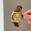 Ladies Metal Casual Round Dial Medieval Style Watch With Convex Lens Design And Calendar