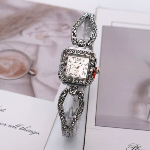 Ladies Quartz Bracelet Watch Flower Shaped Alloy Encrusted With Diamond Leisure Style