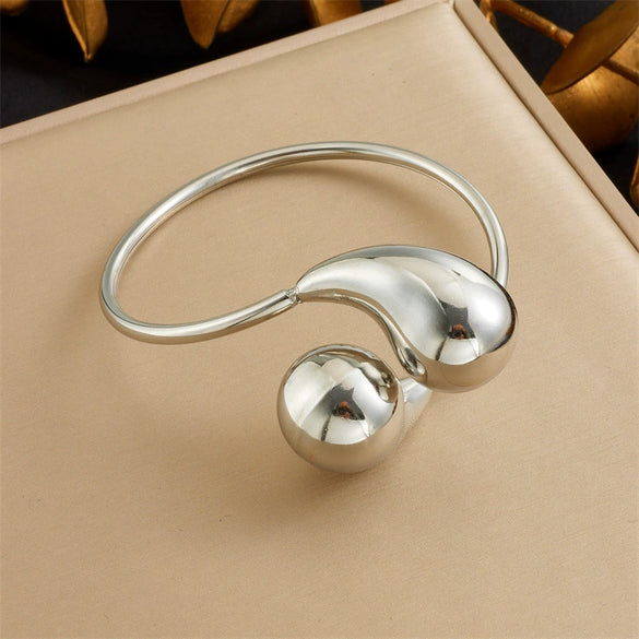 Ladies Stainless Steel Hollow Smooth Water Drop Bracelet With Love Bells Pattern Electroplated
