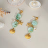 Light Luxury Beach Style Women's Stainless Steel Earrings With Pearl Shell Pendant Pvd Furnace Vacuum Real Gold Plated