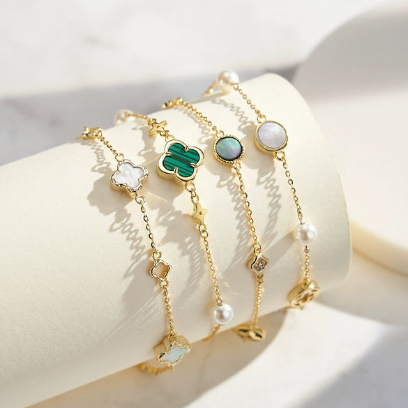 Light Luxury High End Feeling 925 Sterling Silver Niche Design Exquisite Hollow Out Geometric Lucky Grass Mother Shell Women's Bracelet With Electroplating