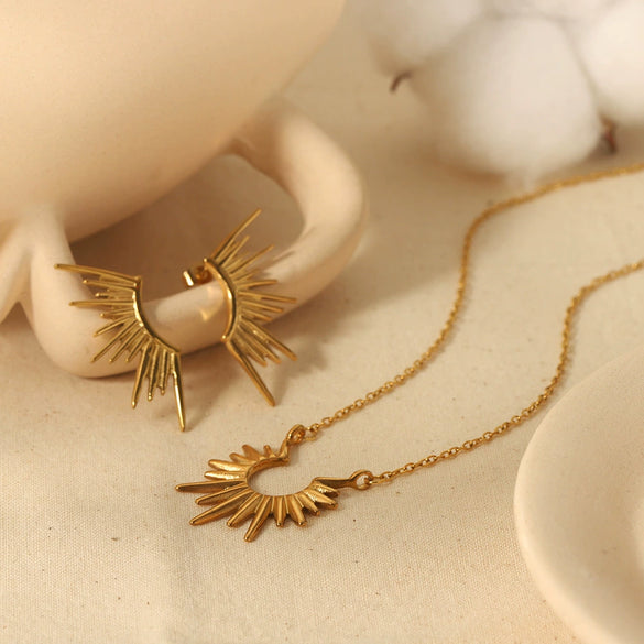 Light Luxury Niche Fashion Stainless Steel Geometric Earrings With Sun Light Pendant And Electroplating Treatment
