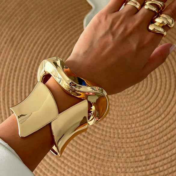 Metal Geometric Personality Electroplated Spring Bracelet With Irregular Wave Opening Design