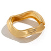 Metal Geometric Personality Electroplated Spring Bracelet With Irregular Wave Opening Design