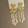 Metal Tassel Earrings With Flower Pattern Electroplated In Silver Needle Style Fashion Light Luxury Cold Retro Allmatch Highend For Women