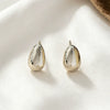 Minimalist Geometric Cshaped Alloy Earrings With A Smooth Electroplated Finish And Stainless Steel Ear Posts