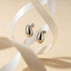 Minimalist Geometric Cshaped Alloy Earrings With A Smooth Electroplated Finish And Stainless Steel Ear Posts