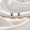 Minimalist Geometric Cshaped Alloy Earrings With A Smooth Electroplated Finish And Stainless Steel Ear Posts