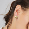 Minimalist Geometric Star Copper Stud Earrings With Smooth Round Button Shape And Diamond Studded Detail For Women