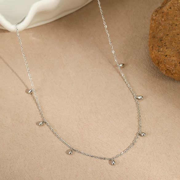 Minimalist Light Luxury Niche Stainless Steel Necklace With Water Drops Tassel Geometric Pattern Electroplated For Women