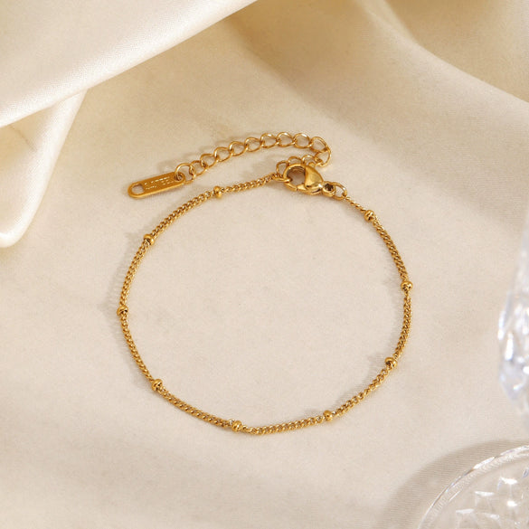 Minimalist Women's Stainless Steel Bead Bracelet With Line Pattern And 18K Gold Electroplated Finish