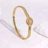 Modern Minimalist Stainless Steel Bracelet For Women With Gold Electroplated Striped Geometric Round Design
