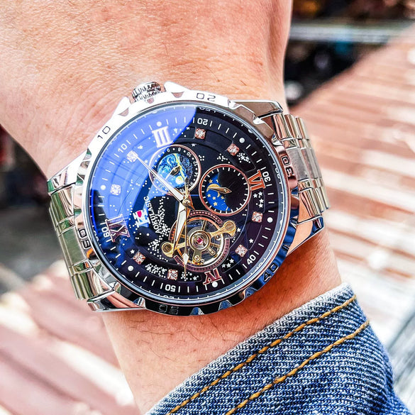 Multifunctional Men's Fully Automatic Mechanical Watch With Luminous Waterproof Moon Phase Round Dial Hollow Design Alloy Case Stainless Steel Strap And Butterfly Clasp