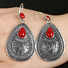 Natural Style Electroplated Metal Drop Earrings With Red Pine Gem Retro Court Inspired Statement Jewelry