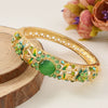 New Style Cloisonné Bracelet In Alloy With Large Circle Cut Out Inlaid With High Grade Diamond And Electroplated