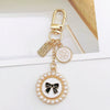 New Style Metal Airpods Protective Case Keychain Pendant With Electroplating For Women